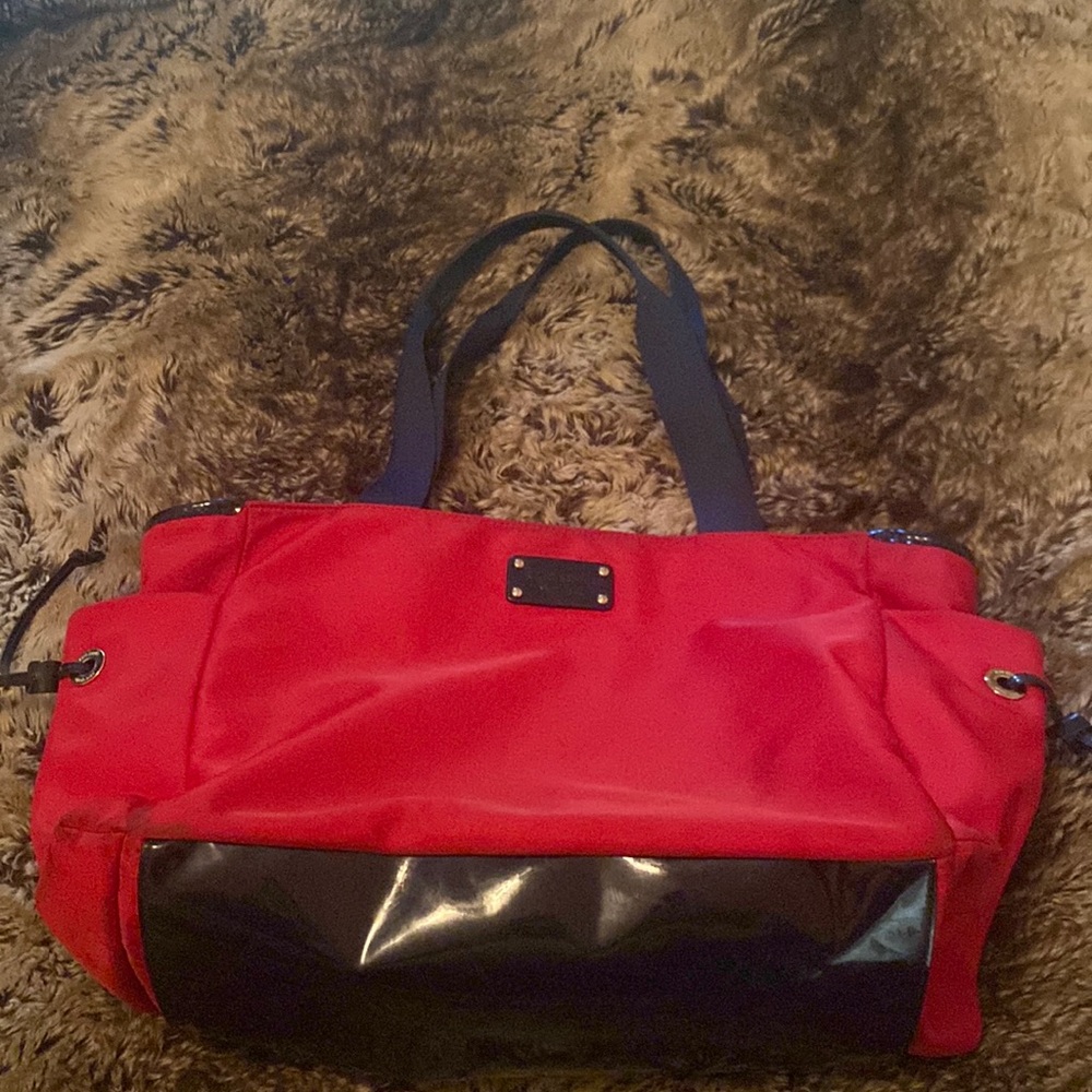 Kate Spade, canvas, red diaper bag/tote. Many pockets.